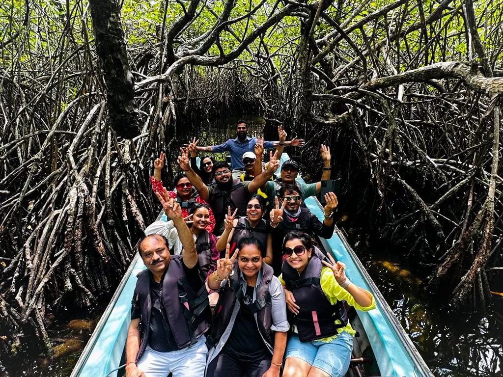 Balakrishnan and his family enjoy a boat ride in Jakarta with a group during their Jakarta tour package from India.