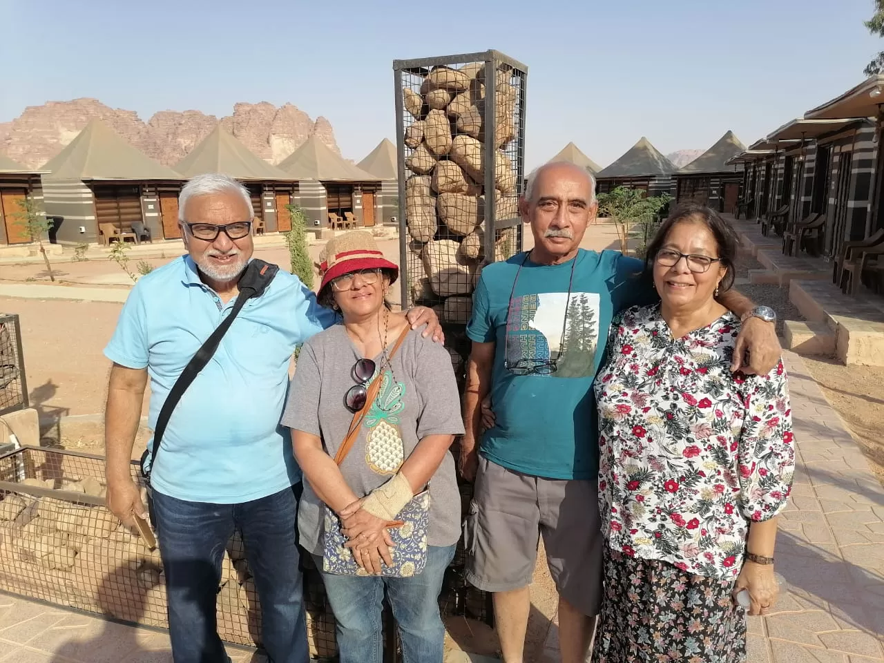 Nitin and his wife, along with another couple, enjoying their time at the Wadi Rum camp during their Jordan tour package from India.
