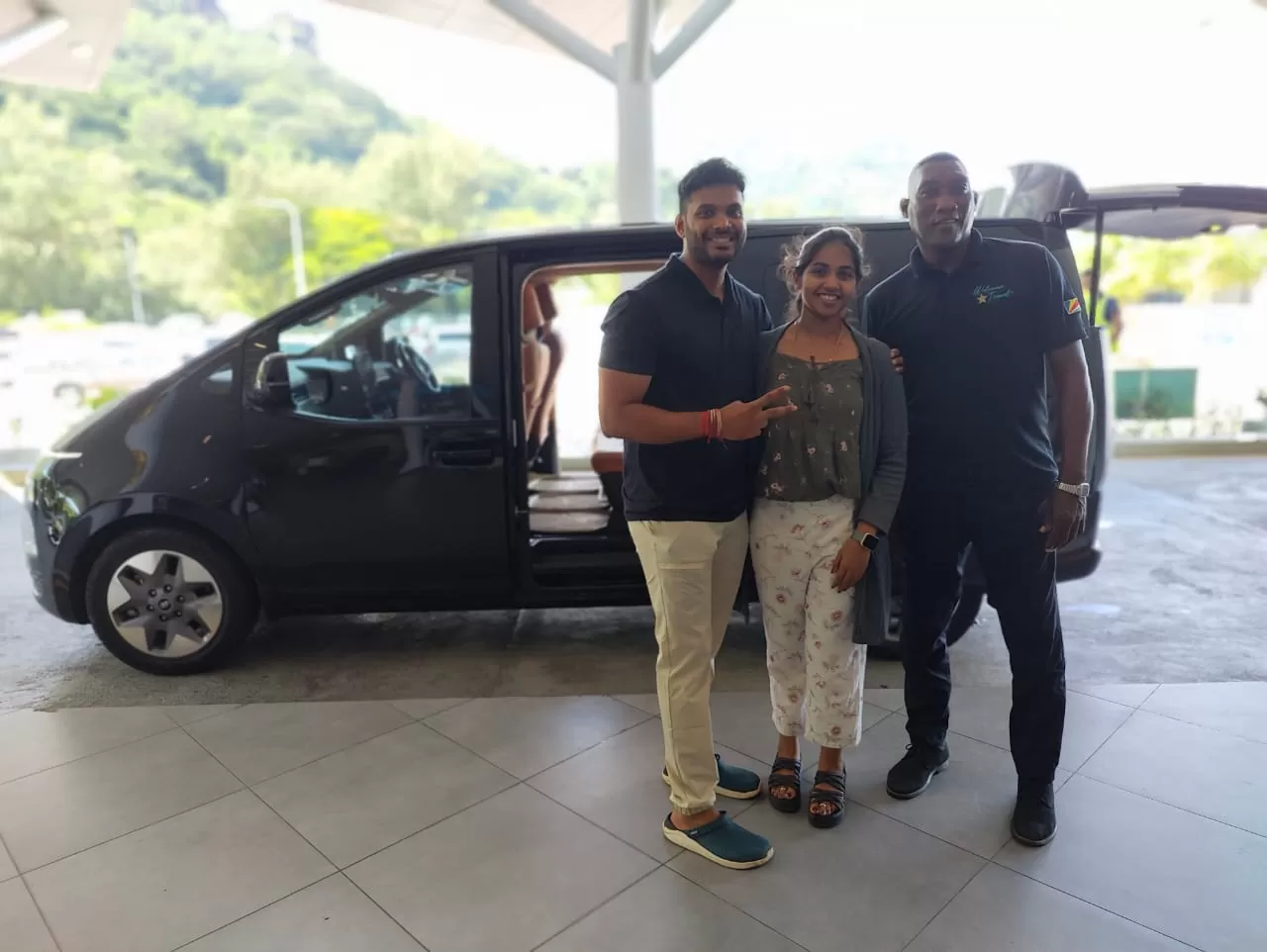 Medha and her husband being warmly picked up from Mahe Airport by Mr. Damien, commencing their enchanting Seychelles tour from Mumbai with Lestacworld.